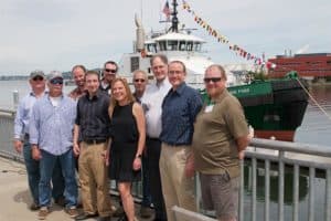 Denise Tabbutt with some of the Rainier Shipyard team. 