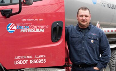 Mike poses with a Delta Western Truck cab, the logo on the door.
