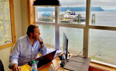 Westlund looks out his office window on a harbor.