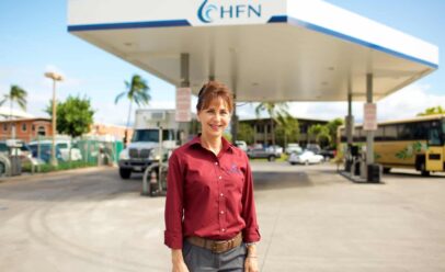 Alfonso stands outside an HFN gas station.