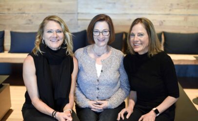 From left, Nicole Michele and Denise lean in together for a photo.