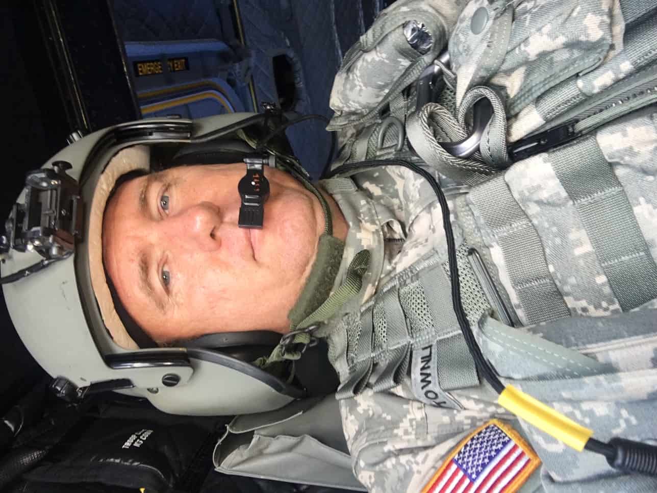 Adam takes a selfie in his uniform.
