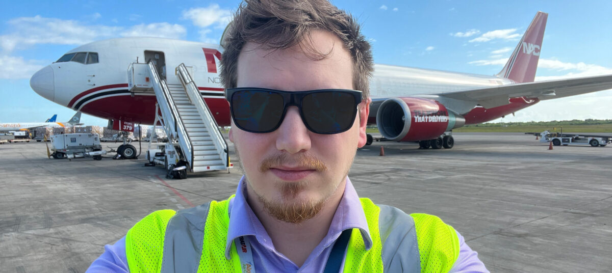 Brian Stroble standing in front of a NAC airplane