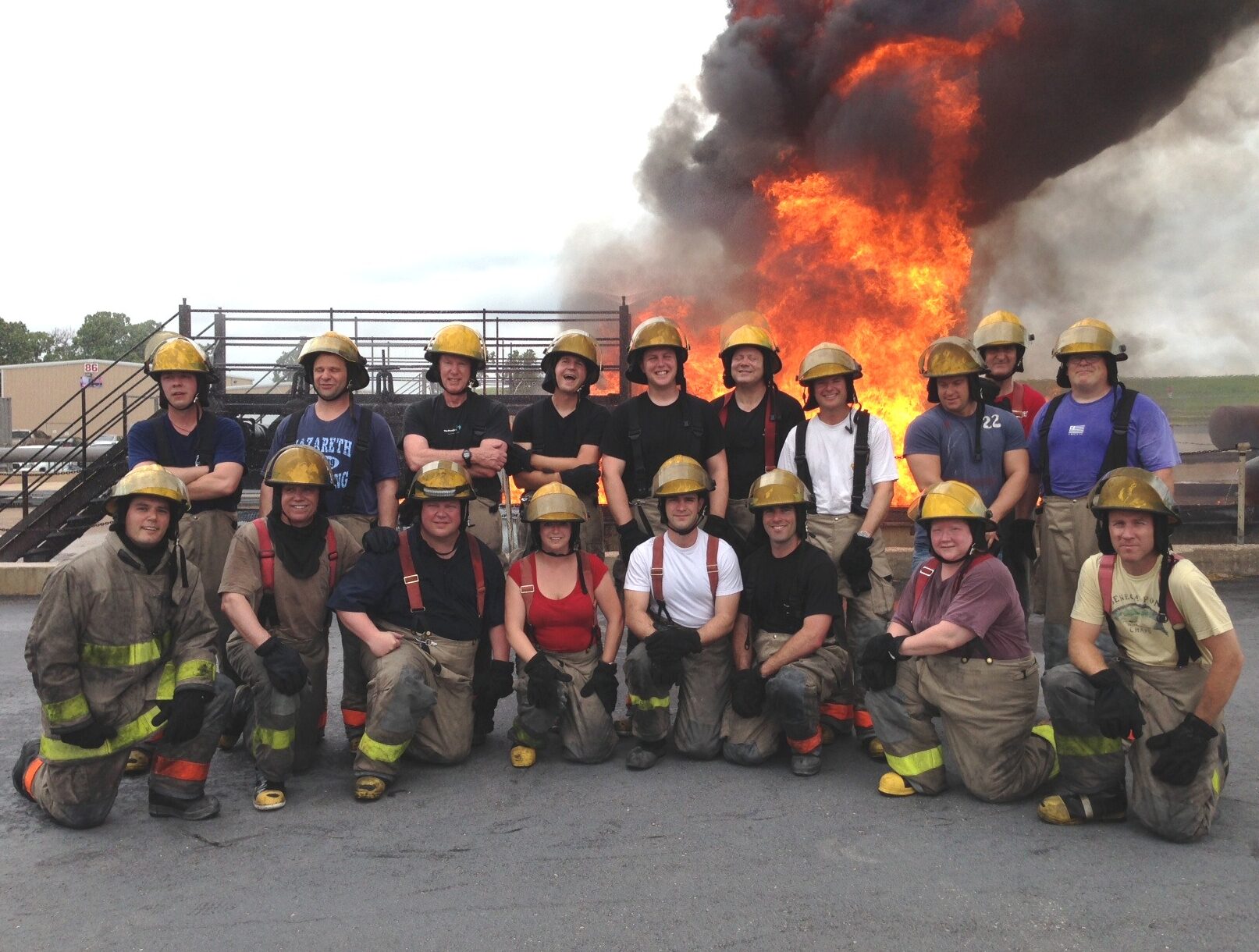 Karen Hays posing for a group photo at an Advanced Maritime Fire Fighting School in May 2013 in Texas.